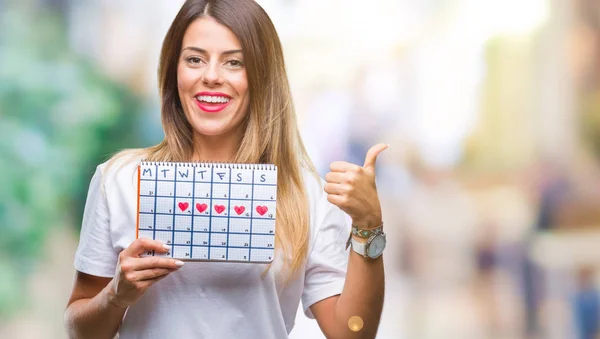 Jonge Mooie Vrouw Houdt Van Menstruatie Kalender Geïsoleerde Achtergrond Aan — Stockfoto