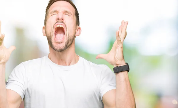 Handsome Man Wearing Casual White Shirt Celebrating Mad Crazy Success — Stock Photo, Image