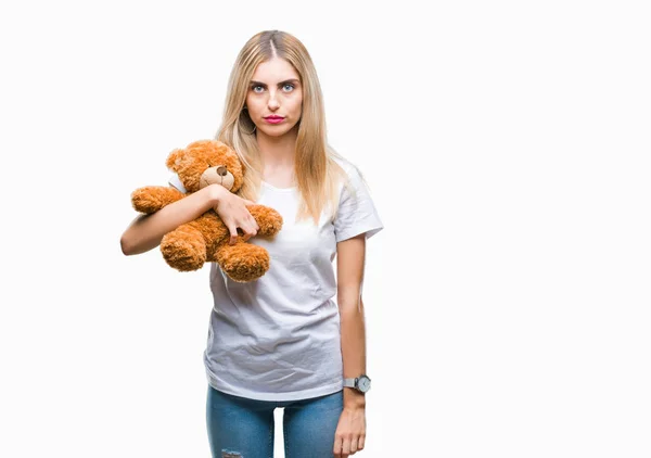 Young Beautiful Blonde Woman Holding Teddy Bear Isolated Background Confident — Stock Photo, Image