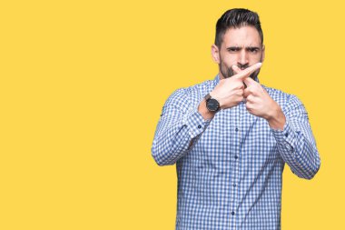 Eksi işareti yapıyor izole arka plan ret ifade geçiş parmakları genç yakışıklı adam