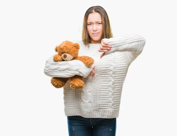 Mujer Caucásica Joven Sosteniendo Osito Peluche Sobre Fondo Aislado Con —  Fotos de Stock