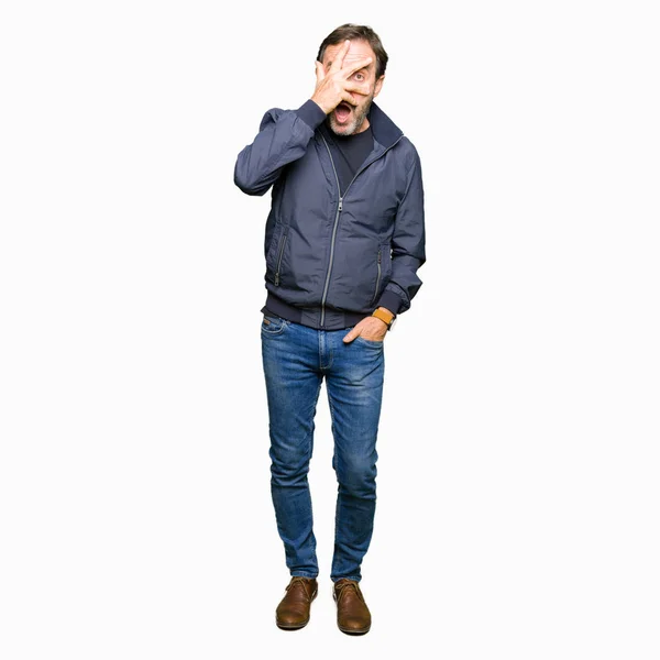 Middle Age Handsome Man Wearing Jacket Peeking Shock Covering Face — Stock Photo, Image