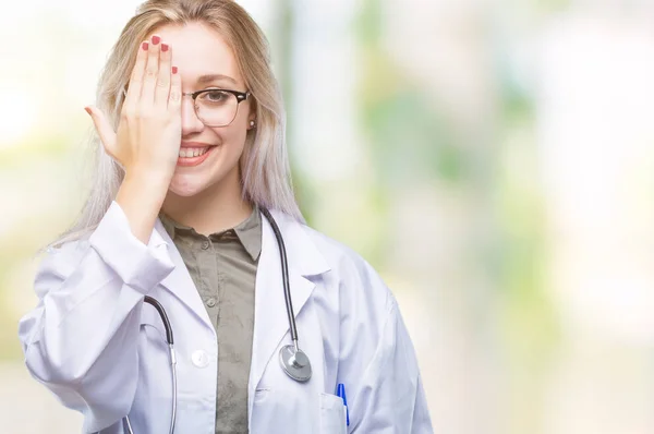 Young Blonde Doctor Woman Isolated Background Covering One Eye Hand — Stock Photo, Image