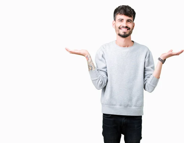 Jovem Bonitão Vestindo Camisola Sobre Fundo Isolado Sorrindo Mostrando Ambas — Fotografia de Stock