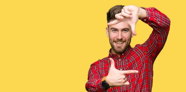 Joven Hombre Guapo Sonriendo Haciendo Marco Con Manos Dedos Con —  Fotos de Stock