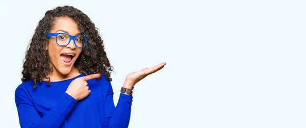 Young Beautiful Woman Curly Hair Wearing Glasses Amazed Smiling Camera — Stock Photo, Image