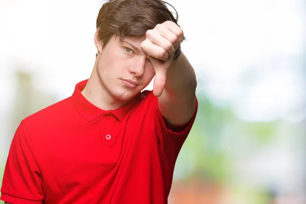 Junger Gutaussehender Mann Rotem Shirt Über Isoliertem Hintergrund Der Unglücklich — Stockfoto