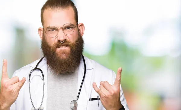 Young Blond Doctor Man Beard Wearing Medical Coat Shouting Crazy — Stock Photo, Image