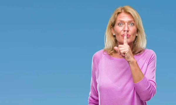Middle Age Blonde Woman Isolated Background Asking Quiet Finger Lips — Stock Photo, Image