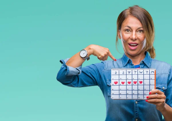 Middelbare Leeftijd Senior Spaanse Vrouw Houdt Van Menstruatie Kalender Geïsoleerde — Stockfoto