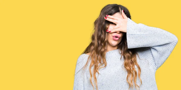 Young Beautiful Woman Wearing Winter Sweater Peeking Shock Covering Face — Stock Photo, Image