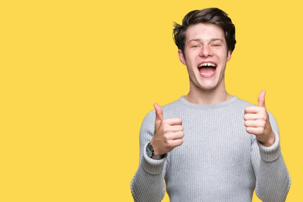 Joven Hombre Guapo Con Suéter Invierno Sobre Signo Éxito Fondo —  Fotos de Stock