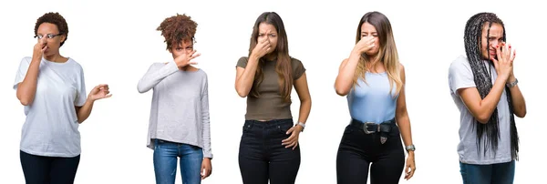 一群年轻妇女在孤立的背景下 闻到了一些臭气熏天 难闻的气味 用手指在鼻子上屏住呼吸 难闻的气味概念 — 图库照片