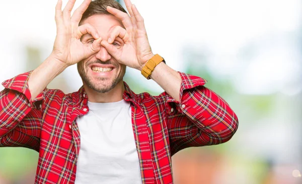 Handsome Man Wearing Casual Shirt Doing Gesture Binoculars Sticking Tongue — Stock Photo, Image