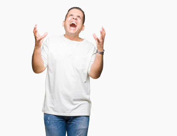 Medelåldern Arabiska Mannen Wearig Vit Shirt Över Isolerade Bakgrund Crazy — Stockfoto