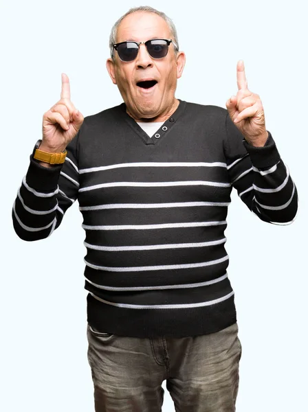 Handsome Senior Man Wearing Winter Sweater Sunglasses Amazed Surprised Looking — Stock Photo, Image