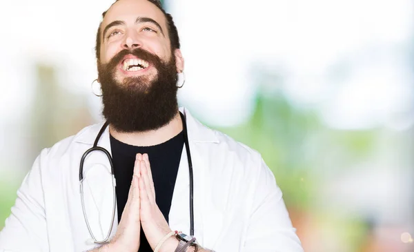 Doctor Long Hair Wearing Medical Coat Stethoscope Begging Praying Hands — Stock Photo, Image