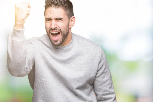 Junger Gutaussehender Mann Der Sweatshirt Über Isoliertem Hintergrund Trägt Und — Stockfoto