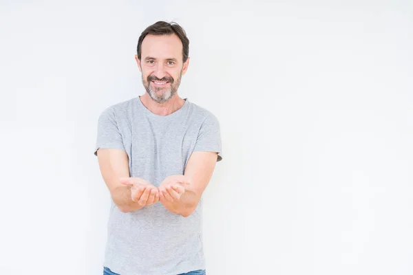 Hombre Mayor Guapo Sobre Fondo Aislado Sonriendo Con Las Palmas —  Fotos de Stock