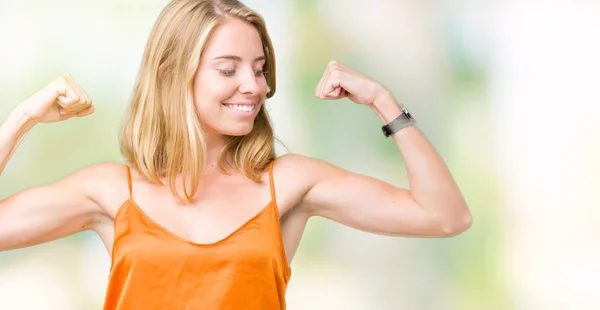 Beautiful Young Woman Wearing Orange Shirt Isolated Background Showing Arms — Stock Photo, Image