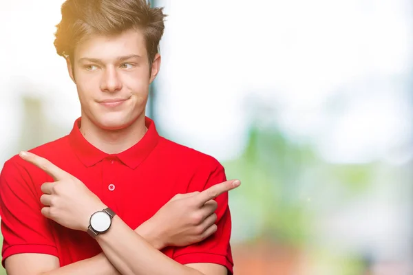 Homem Bonito Jovem Vestindo Camiseta Vermelha Sobre Fundo Isolado Apontando — Fotografia de Stock