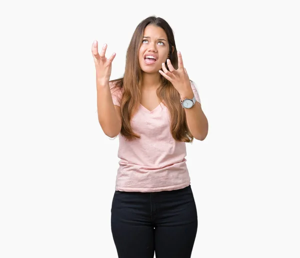 Joven Hermosa Morena Vistiendo Camiseta Rosa Sobre Fondo Aislado Loco — Foto de Stock