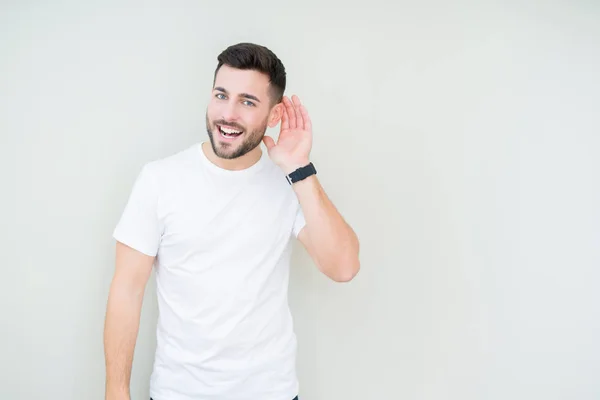 Joven Hombre Guapo Con Camiseta Blanca Casual Sobre Fondo Aislado —  Fotos de Stock