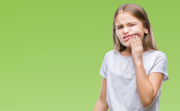 Young beautiful girl over isolated background touching mouth with hand with painful expression because of toothache or dental illness on teeth. Dentist concept.