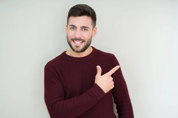 Junger Gutaussehender Mann Der Einen Pullover Über Isoliertem Hintergrund Trägt — Stockfoto