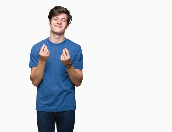 Jovem Bonitão Vestindo Camiseta Azul Sobre Fundo Isolado Fazendo Gesto — Fotografia de Stock