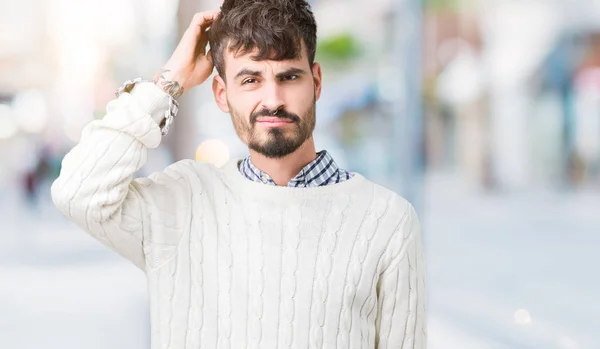 Young Handsome Man Wearing Winter Sweater Isolated Background Confuse Wonder — Stock Photo, Image