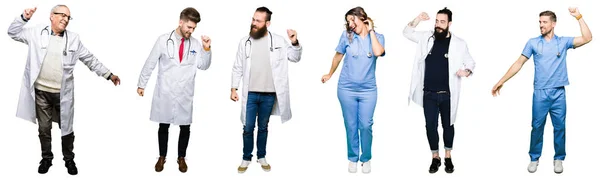 一群医生和外科医生的人在白色隔绝的背景跳舞愉快和愉快 微笑移动休闲和自信听音乐 — 图库照片