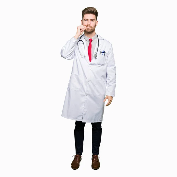 Young Handsome Doctor Man Wearing Medical Coat Mouth Lips Shut — Stock Photo, Image