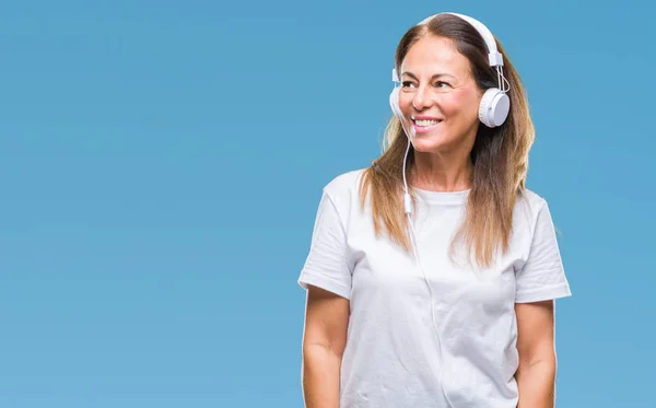 Middle Age Hispanic Woman Listening Music Wearing Headphones Isolated Background — Stock Photo, Image