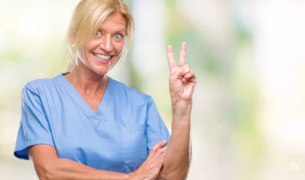 Mujer Rubia Mediana Edad Vistiendo Uniforme Enfermera Médico Sobre Fondo —  Fotos de Stock