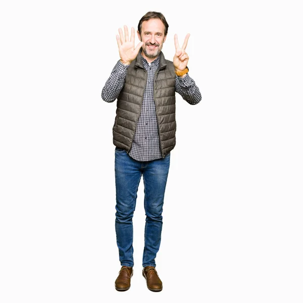 Middle Age Handsome Man Wearing Winter Vest Showing Pointing Fingers — Stock Photo, Image