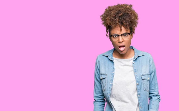 Beautiful Young African American Woman Wearing Glasses Isolated Background Shock — Stock Photo, Image