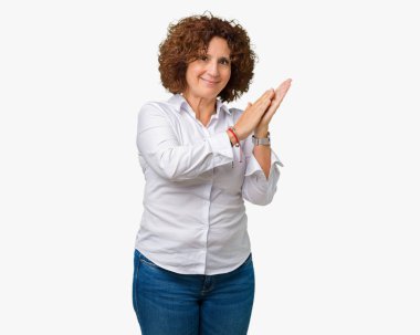Güzel orta ager üst düzey businees kadın izole arka plan Clapping ve mutlu ve neşeli, gururlu gülümseyen birlikte eller alkış