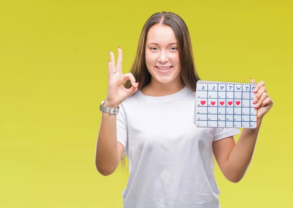 Mulher Caucasiana Jovem Segurando Calendário Menstruação Sobre Fundo Isolado Fazendo — Fotografia de Stock