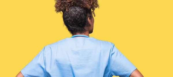 Unga Afrikanska Amerikanska Läkare Kvinna Över Isolerade Bakgrund Stående Bakåt — Stockfoto
