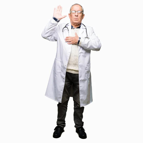 Handsome Senior Doctor Man Wearing Medical Coat Swearing Hand Chest — Stock Photo, Image