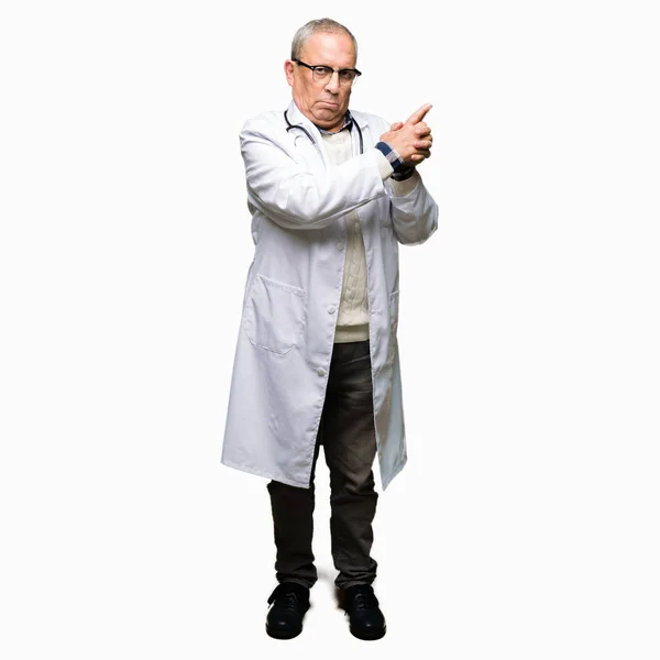 Handsome Senior Doctor Man Wearing Medical Coat Holding Symbolic Gun — Stock Photo, Image