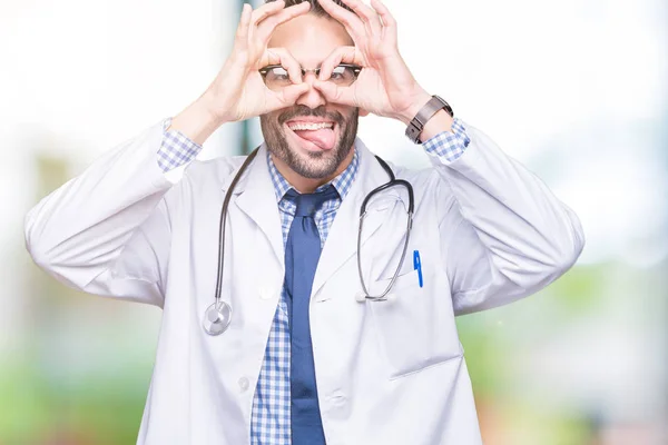 Handsome Young Doctor Man Isolated Background Doing Gesture Binoculars Sticking — Stock Photo, Image