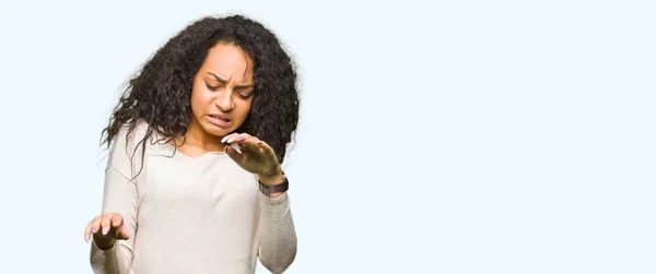 Young Beautiful Girl Curly Hair Wearing Casual Sweater Disgusted Expression — Stock Photo, Image