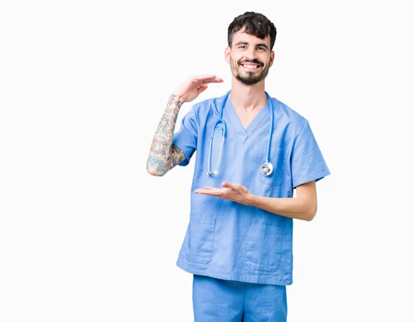 Joven Enfermero Guapo Con Uniforme Cirujano Sobre Fondo Aislado Gesto —  Fotos de Stock