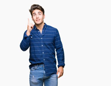 Başarılı fikirle izole arka plan işaret parmağı üzerinde Donanma gömlek giymiş yakışıklı delikanlı. Çıktıktan ve mutlu. Bir numara.
