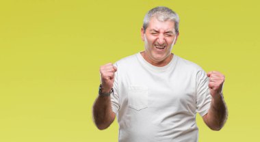 Yakışıklı komuta sizde izole arka kolları olan başarı için heyecan üzerinde zafer kutluyor gülümseyen kaldırdı. Kazanan kavramı.