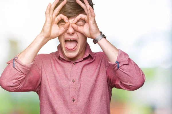 Jonge Knappe Zakenman Geïsoleerde Achtergrond Doen Gebaar Als Verrekijker Steken — Stockfoto