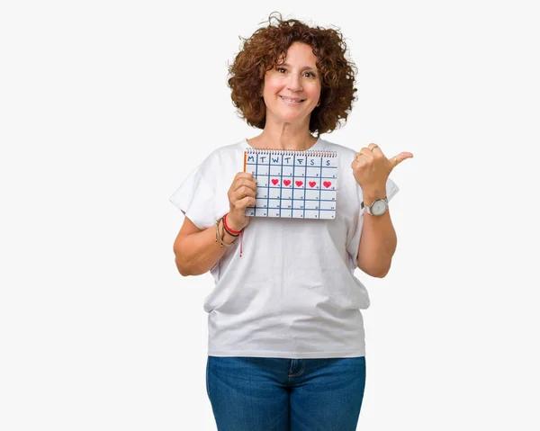 Middle Ager Senior Woman Holding Menstruation Calendar Isolated Background Pointing — Stock Photo, Image
