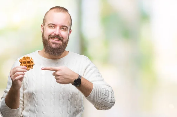 Young Caucasian Hipster Man Eating Sweet Waffle Isolated Background Very — Stock Photo, Image
